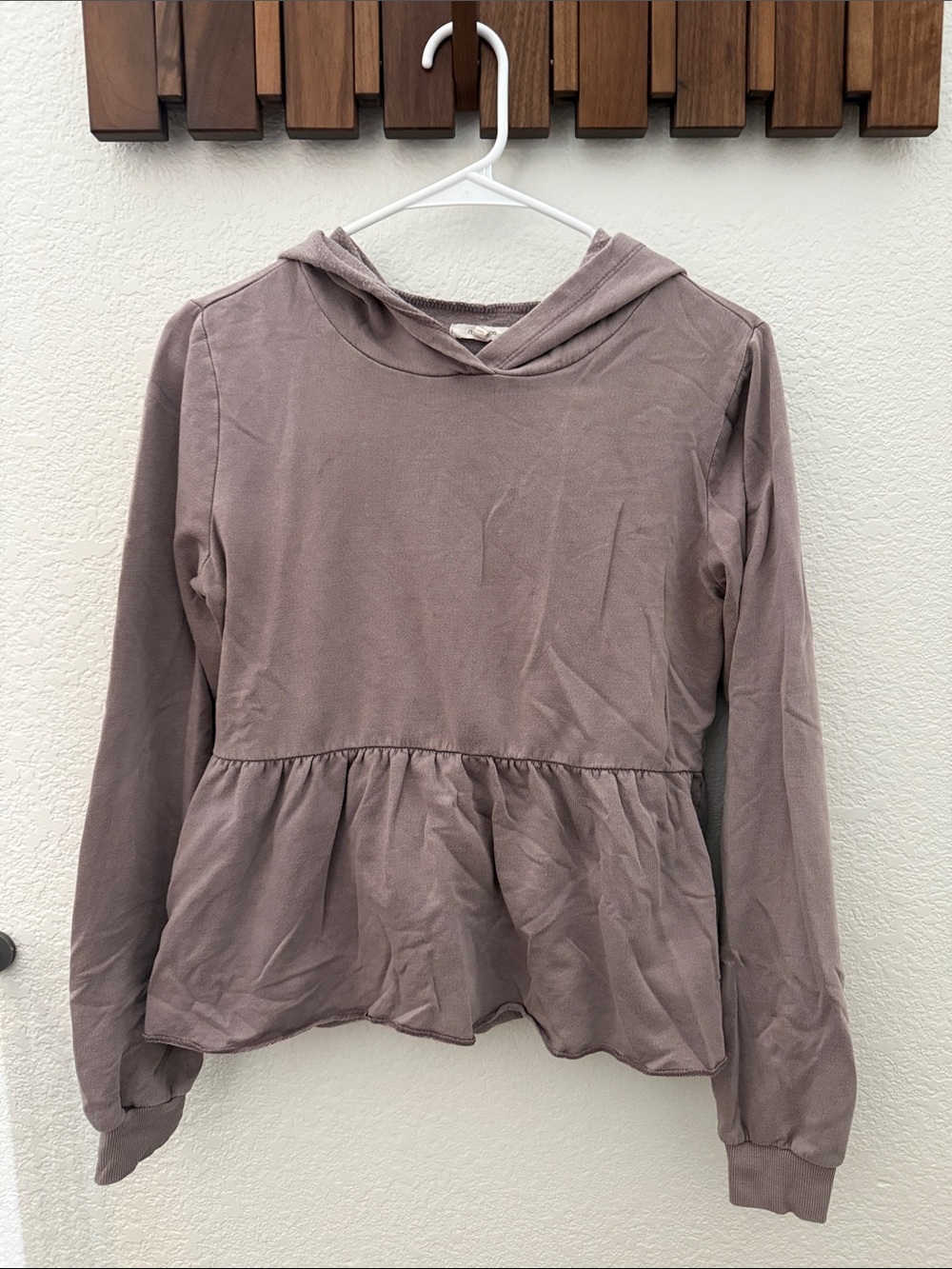 Maurices Long-Sleeve Hooded Peplum Top in Taupe